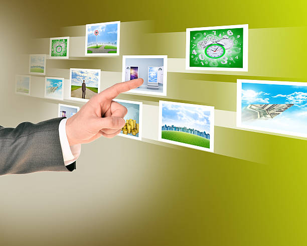 istock Businessman touching holographic pictures 490686442