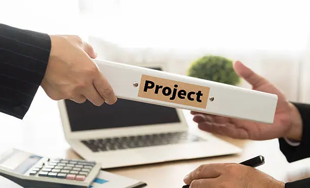 Staff presented the projects to the executives. select focus.