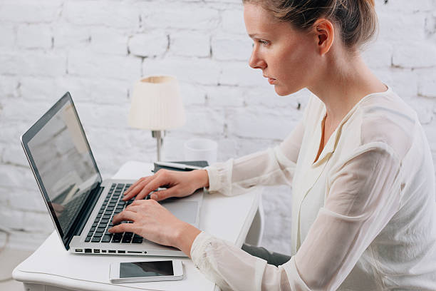 istock Close Up Of Woman Using Laptop 490690546