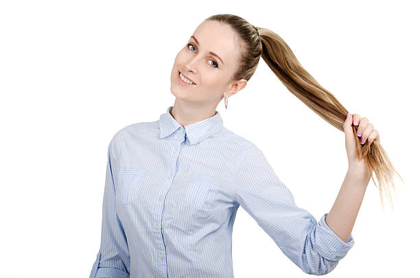 istock girl holding a hand through his hair 490690657