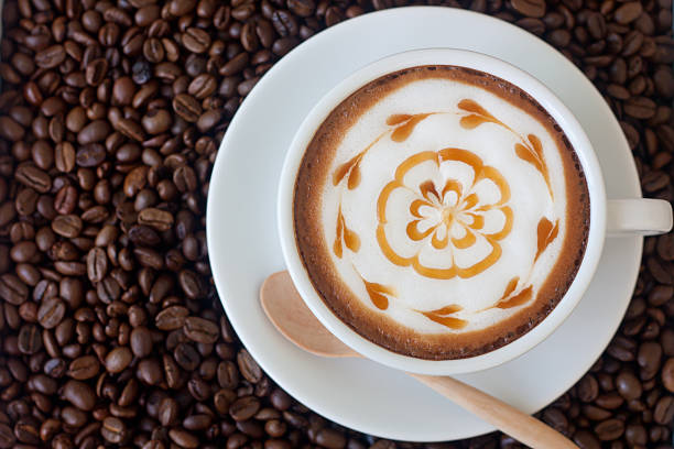 istock cup of coffee on coffee beans background 490691382