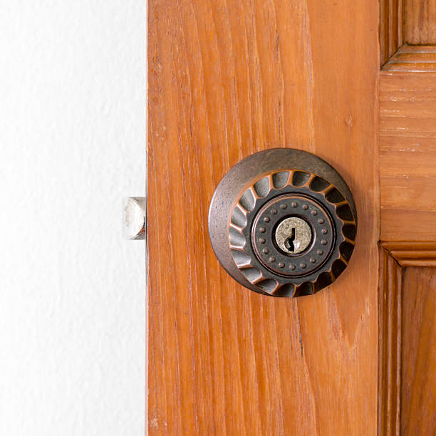 istock door knob and key hole 490692073