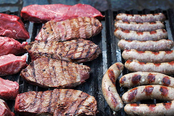 istock Beef steak and sausage on grill 490692894