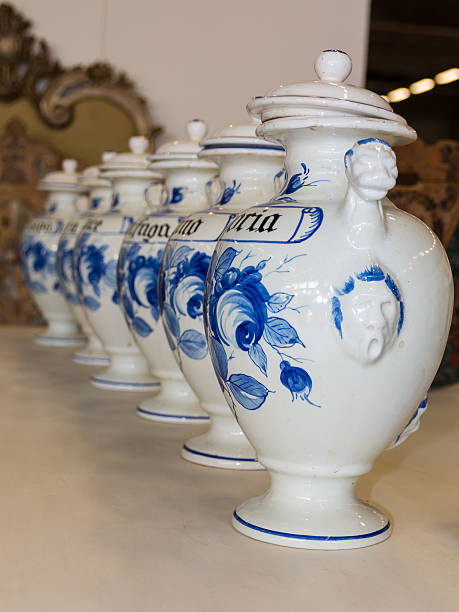 istock ceramic vase line, white urns with caps 490693878