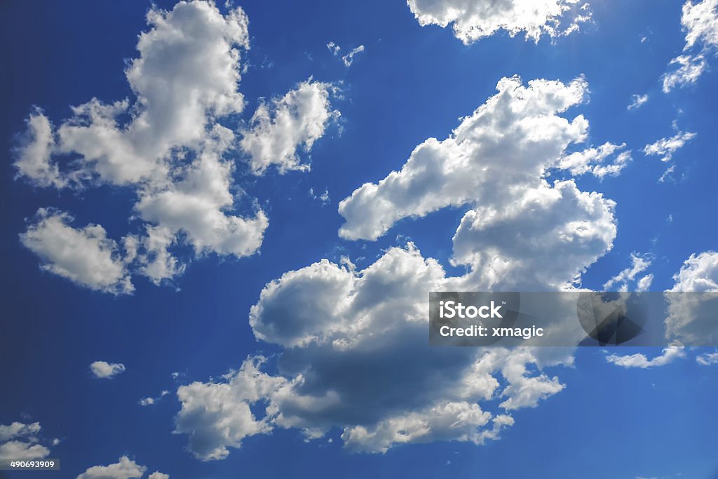 Clouds on blue sky background White clouds on blue sky background Backgrounds Stock Photo