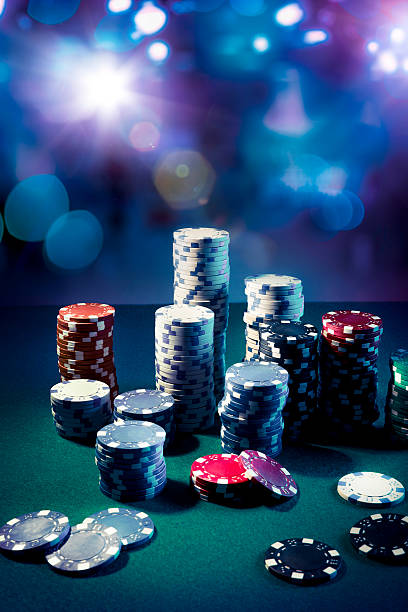 istock Casino chips with dramatic lighting and lens flares 490694421