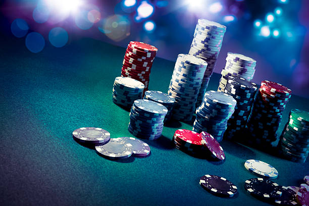 istock Casino chips with dramatic lighting and lens flares 490694863