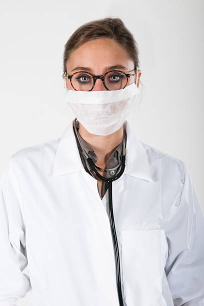 istock woman doctor with a mask 490694990