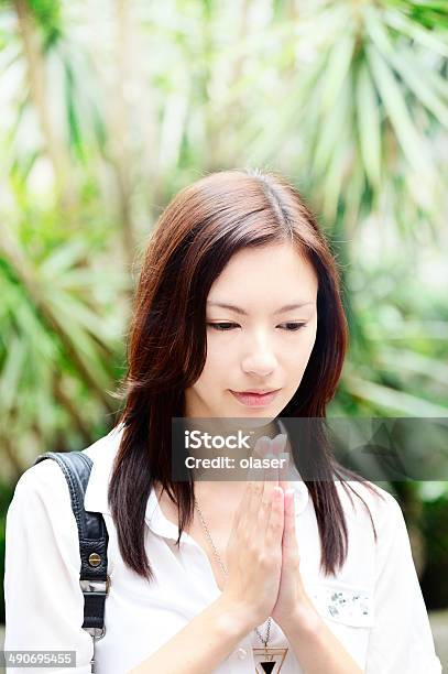 Asian Woman In Business Clothes Praying Stock Photo - Download Image Now - Adult, Adults Only, Asia