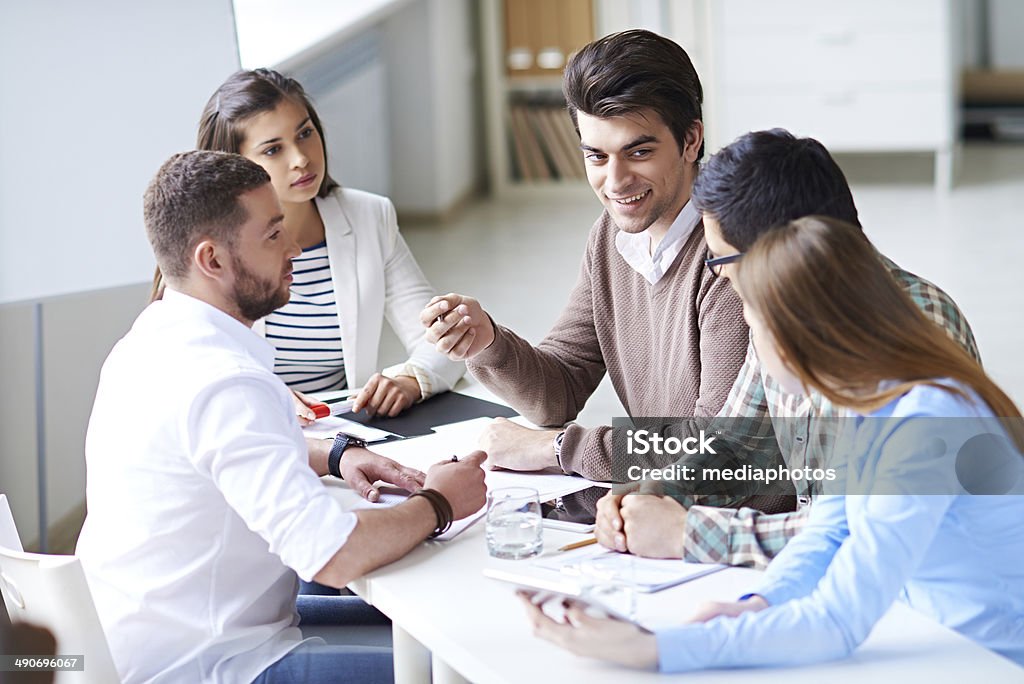 Young team meeting Young business team discussing ideas 20-29 Years Stock Photo
