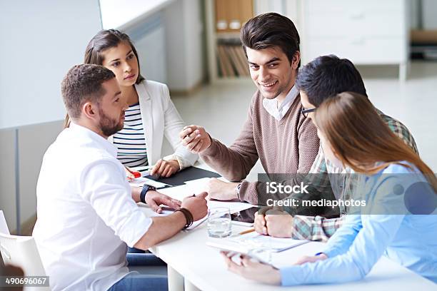 Young Team Meeting Stock Photo - Download Image Now - 20-29 Years, 30-39 Years, Adult