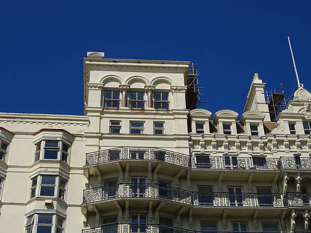 istock Image of Edwardian building with ornate ironwork balconies and scaffolding 490697676