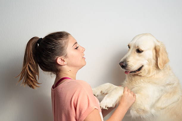 istock girl and her dog 490698002