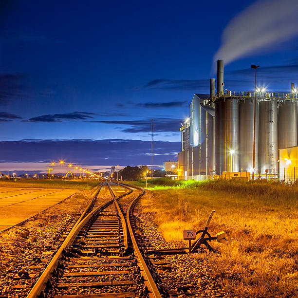 istock Railroad switch in Colorful Industrial Chemical area 490714906