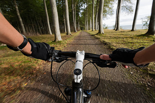 istock Mountain Bike From Riders Perspective With Blur 490715712