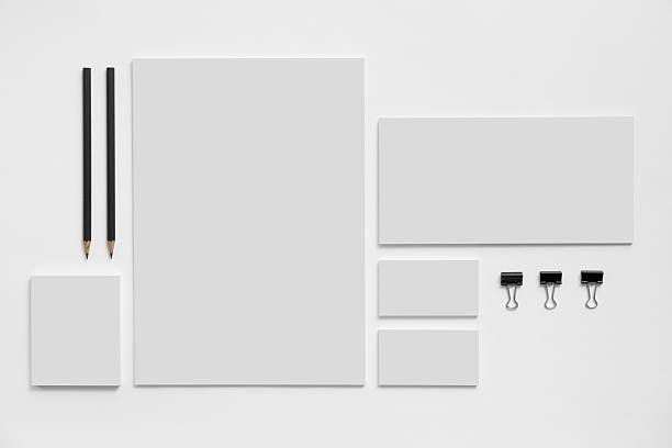 Blank branding mockup with gray business cards on white Blank branding mockup with gray business cards, envelopes and notepads isolated on white background. stationary stock pictures, royalty-free photos & images