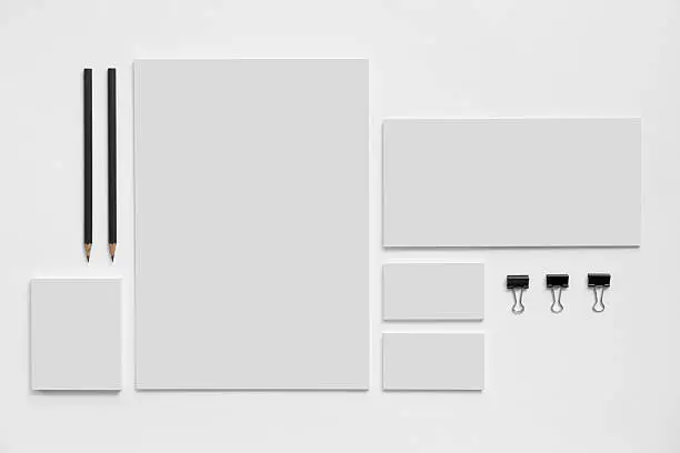 Photo of Blank branding mockup with gray business cards on white