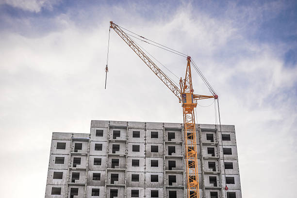 istock Construction of houses and high-rise crane 490717116