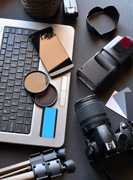 istock desktop with photography equipment 490717136