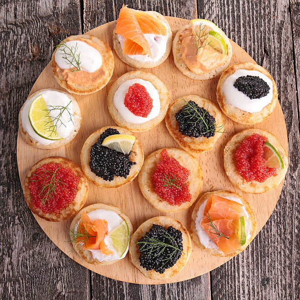 canape,buffet food canape,buffet food blini photos stock pictures, royalty-free photos & images