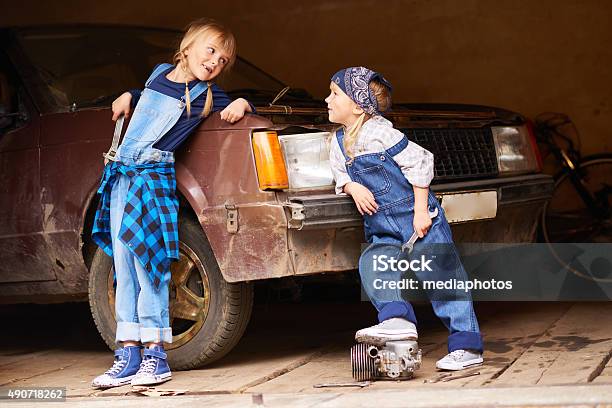 Little Auto Mechanics Stock Photo - Download Image Now - Car, Child, Girls