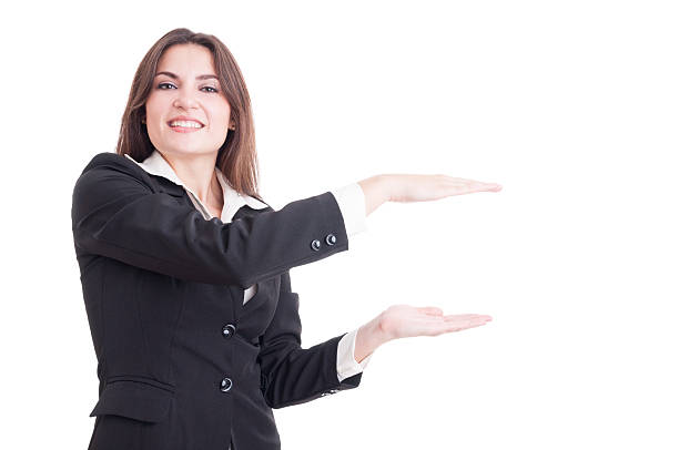 istock Attractive and young business woman presenting white copy space 490719060