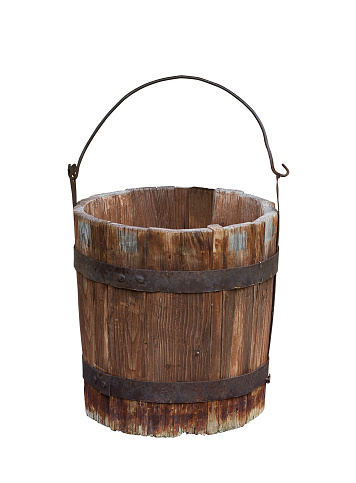 Horizontal front view of an empty wood old bucket with metal handle isolated on white background