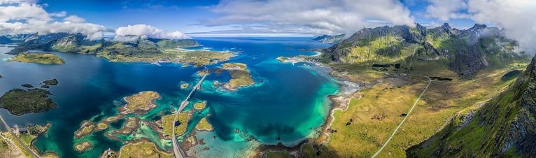 Scenic aerial panorama of Lofoten islands in Norway with beautiful mountains and road bridges connecting islands