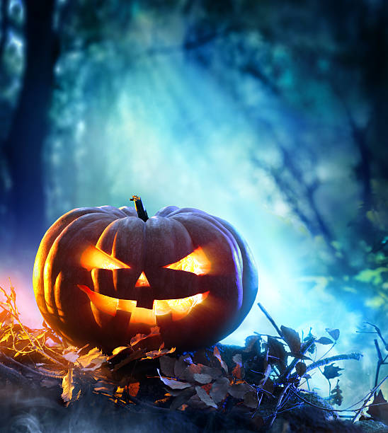 istock Halloween Pumpkin In A Spooky Forest 490722162