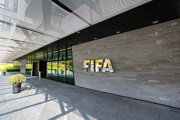 The entrance of the FIFA headquarter in Zurich Zurich, Switzerland - 1 October, 2015: The entrance of the FIFA headquarter in Zurich. The International Federation of Association Football is the governing body of association football, futsal and beach football. FIFA is responsible for the organisation of football's major international tournaments, notably the World Cup. international team soccer stock pictures, royalty-free photos & images