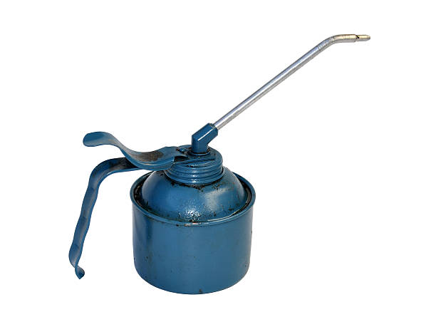 Blue metal oil can with a metal spout stock photo