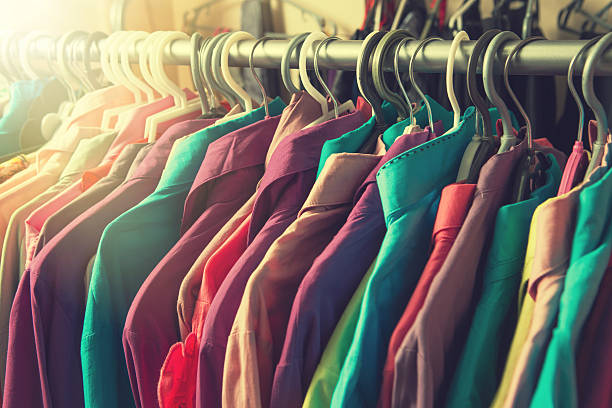 istock Clothes hang on a shelf in a designer clothes store 490726030