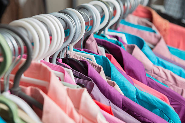 istock Clothes hang on a shelf in a designer clothes store 490726350