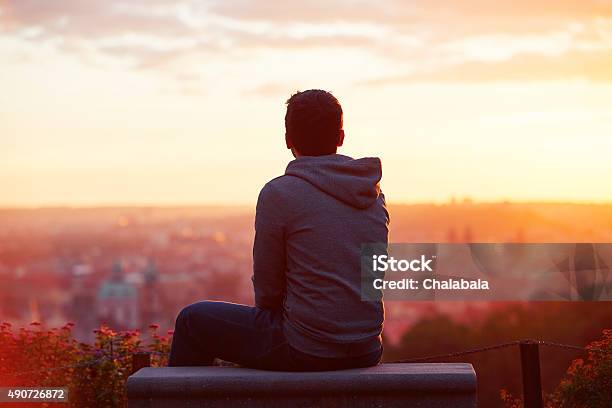 Man At The Sunrise Stock Photo - Download Image Now - Men, Rear View, Hope - Concept