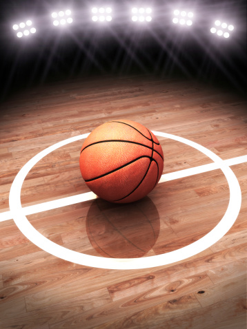 Basketball ball spinning on a green screen - chromakey background. 3d rendering.