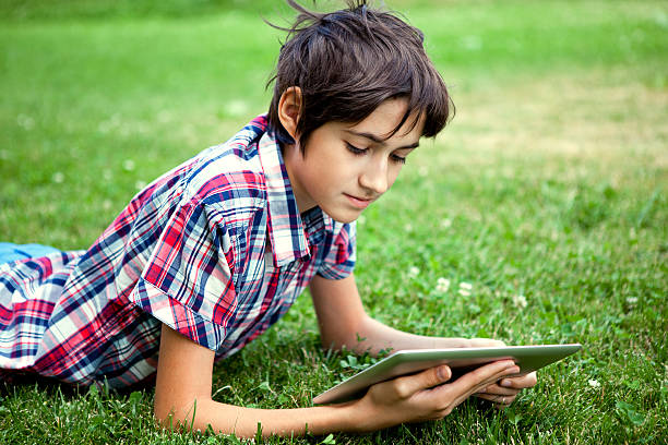 istock Teen uses digital tablet 490733453