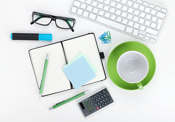 istock Green coffee cup and office supplies 490734443