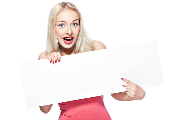 istock Blonde girl shows poster. 490737883