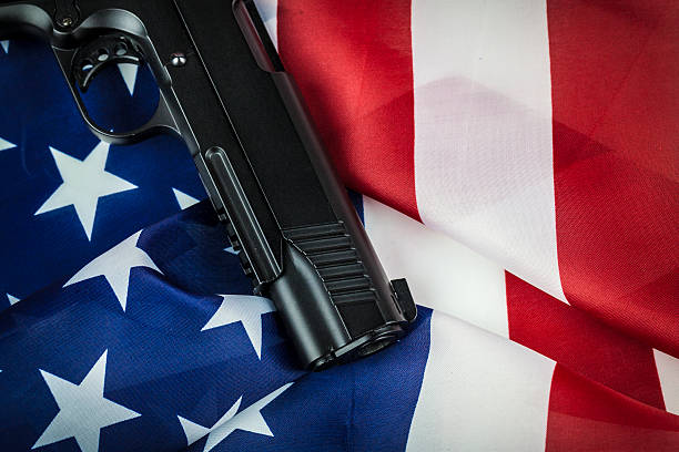 istock Close up Gun with American Flag 490738047