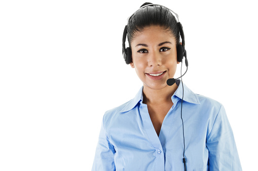 Stock image of female call center operator isolated on white