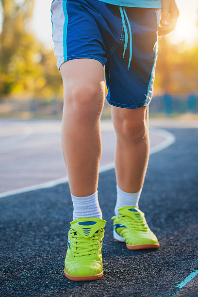 istock Runner's Feet Running on Stadium 490747734