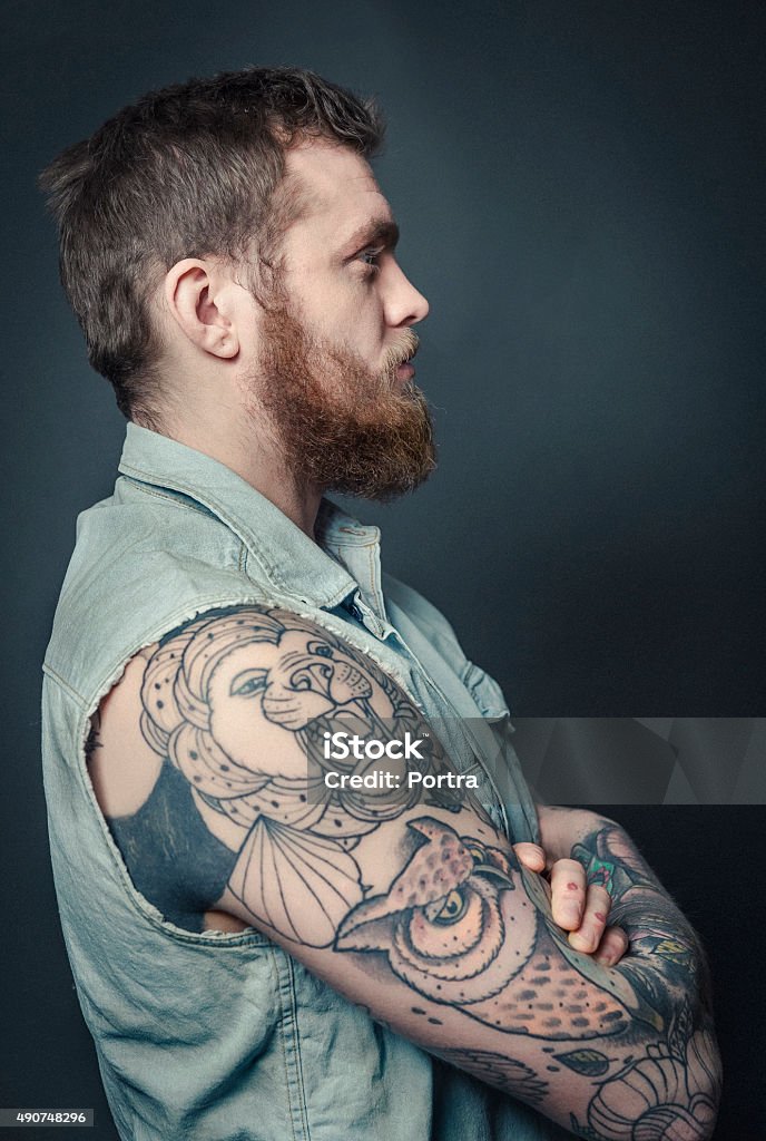 Hipster With Animal Tattoos On Arm Stock Photo - Download Image Now - Lion  - Feline, Men, Tattoo - iStock