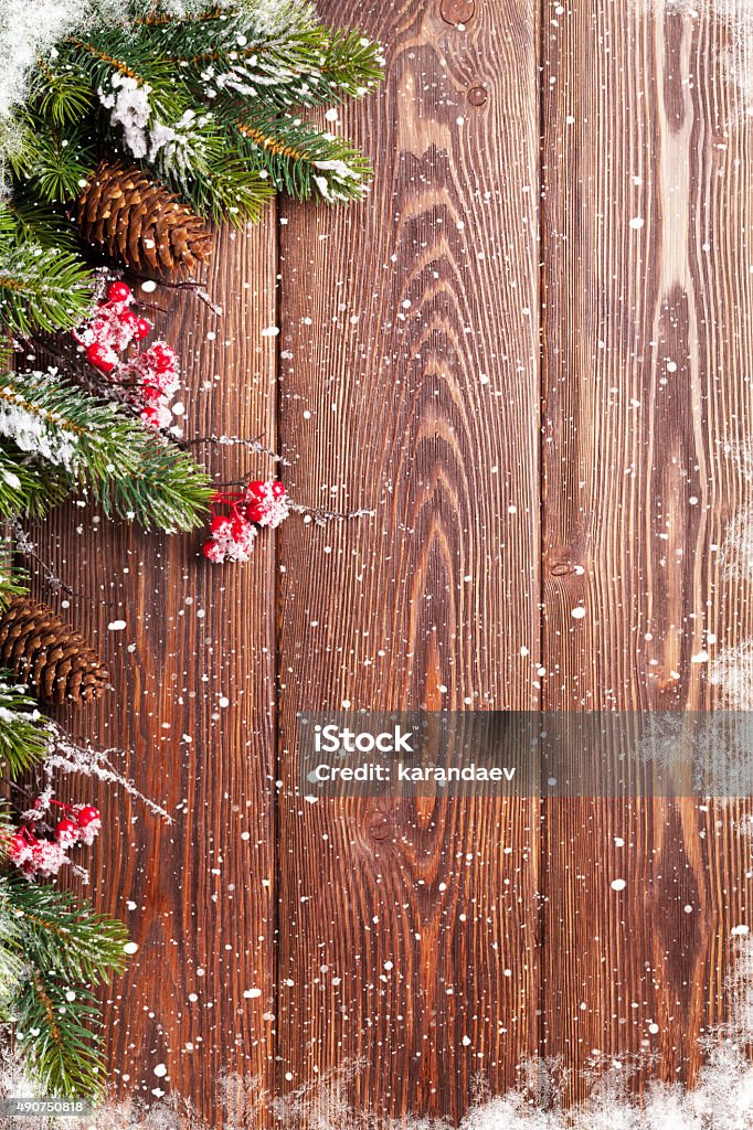 Christmas background with fir tree Christmas wooden background with snow fir tree. View with copy space Christmas Stock Photo