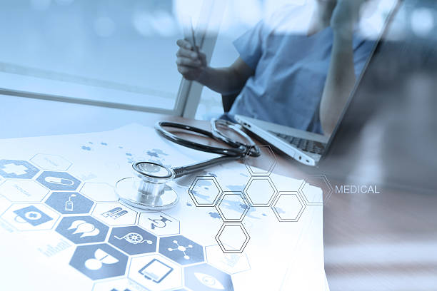 istock Doctor working with digital tablet and laptop computer 490753606