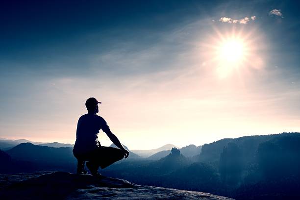 istock Runner in cap and  in sportswear. Man in squatting position 490753624