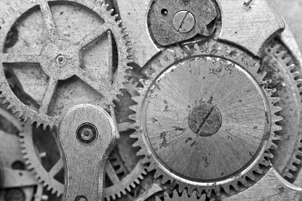 istock Black-and-white Metal Cogwheels in Oldest Clockwork, Macro. 490754774