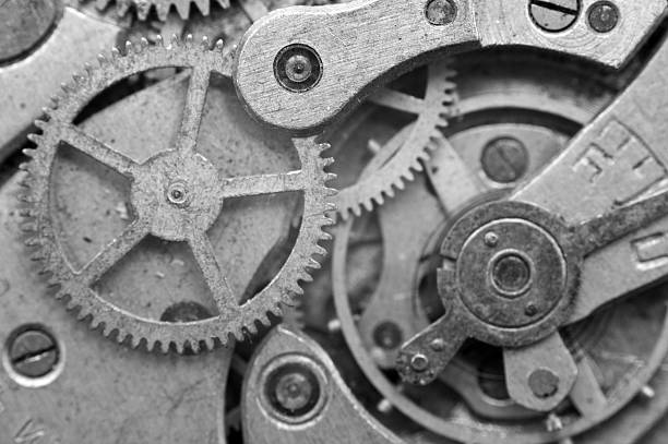 istock Black-and-white Metal Cogwheels in Oldest Clockwork, Macro. 490755134