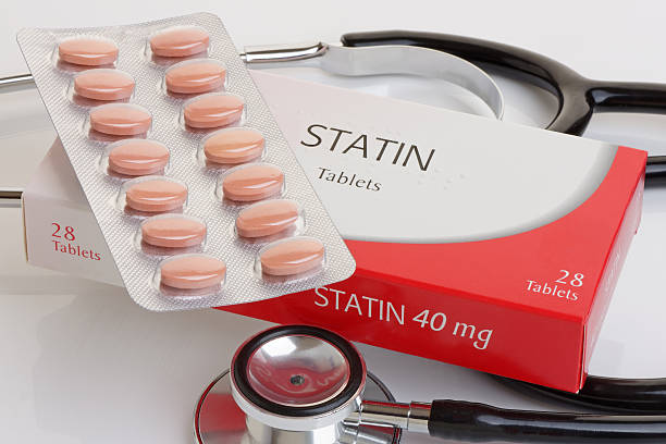 Generic Pack of Statins A generic pack of statins with a stethoscope.  A controversial anti cholesterol medication.All logos removed. statin stock pictures, royalty-free photos & images