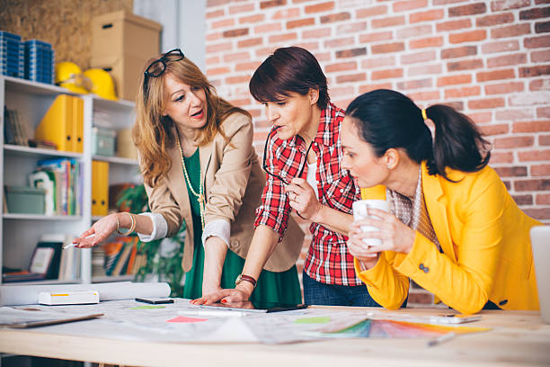 istock Three mature woman working in office. 490759360