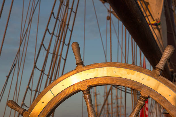 istock Wooden steering wheel on a ship 490760482